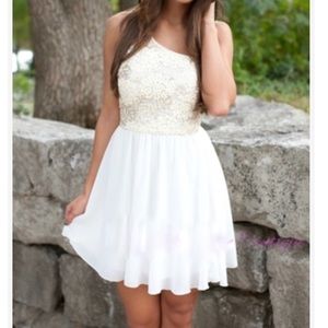 Over one shoulder sequin and chiffon ivory dress