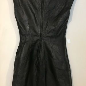 Leather dress. Never worn. Size small. Bebe brand