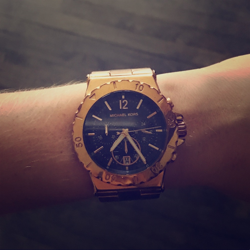 Rose gold michael kors watch with navy blue face