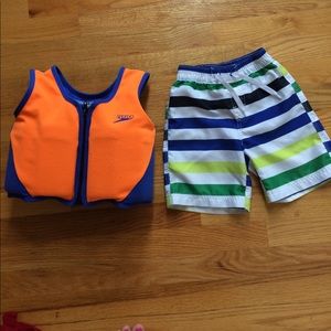 2T bathing suit and speedo life vest