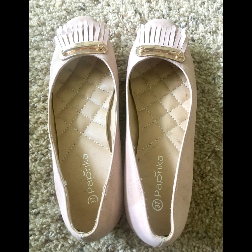 Nude pink pump sandals with pretty tassels