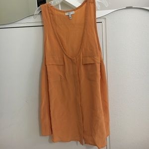 Lightly worn orange tank