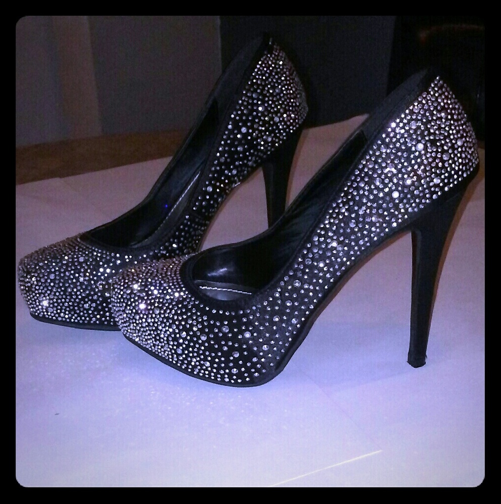 Vigo Fiore studded platform pumps.