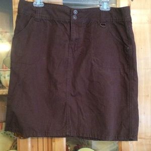 Size 12 brown short skirt.  Material is denim-like