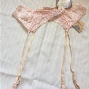 Soft Pink silk garter belt by Christian Dior