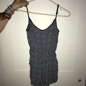 Navy romper with white flowers