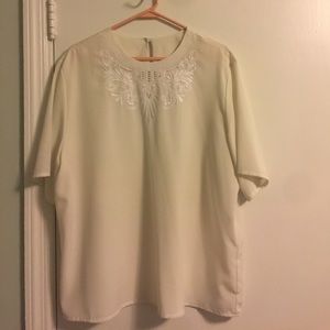 Never Worn Silk Top with button-back closure