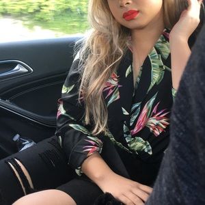 Black button down silk blouse with tropical prints