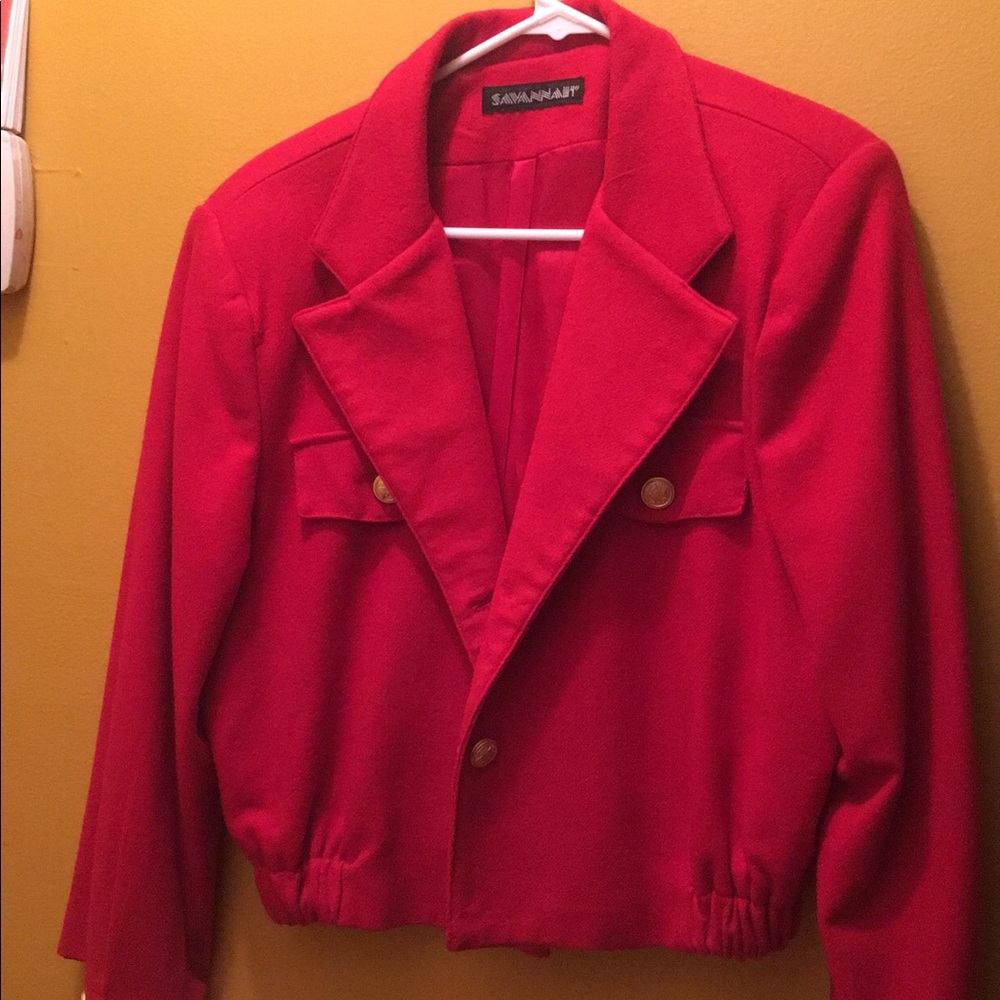Red blazer-- old school with shoulder pads..