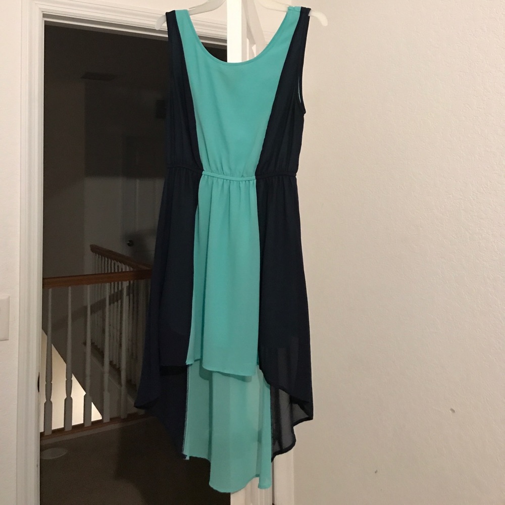 Two variations of blue striped high low dress.
