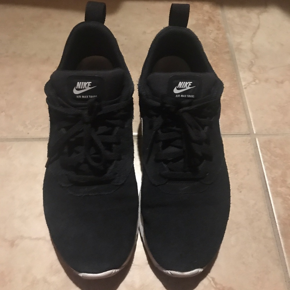 Black and white Nike running shoes