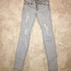 Light blue ripped jeans