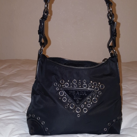 prada grommet bag