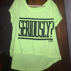 A green short sleeve shirt