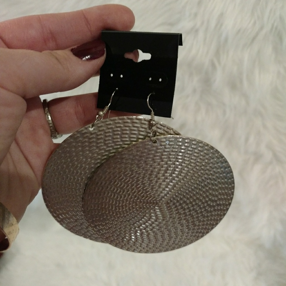 New silver tone large disk earrings