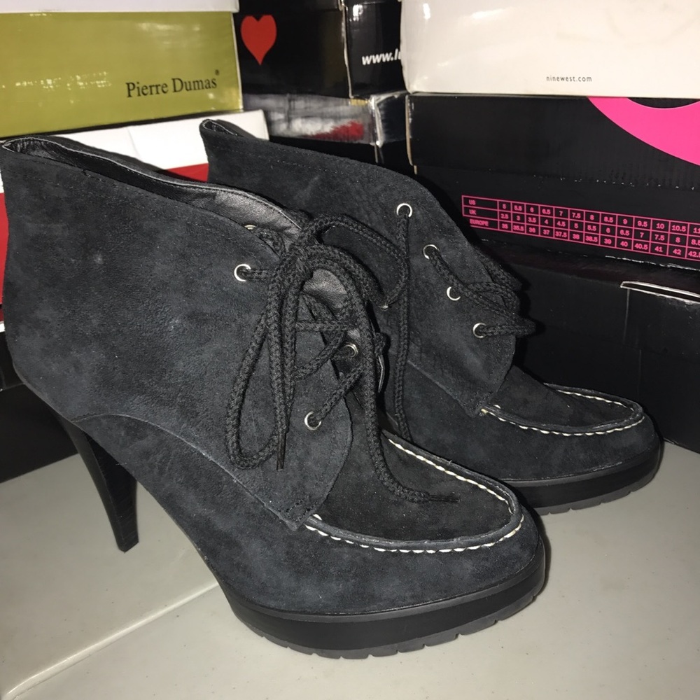 Genuine Leather lace up black booties. Brand new