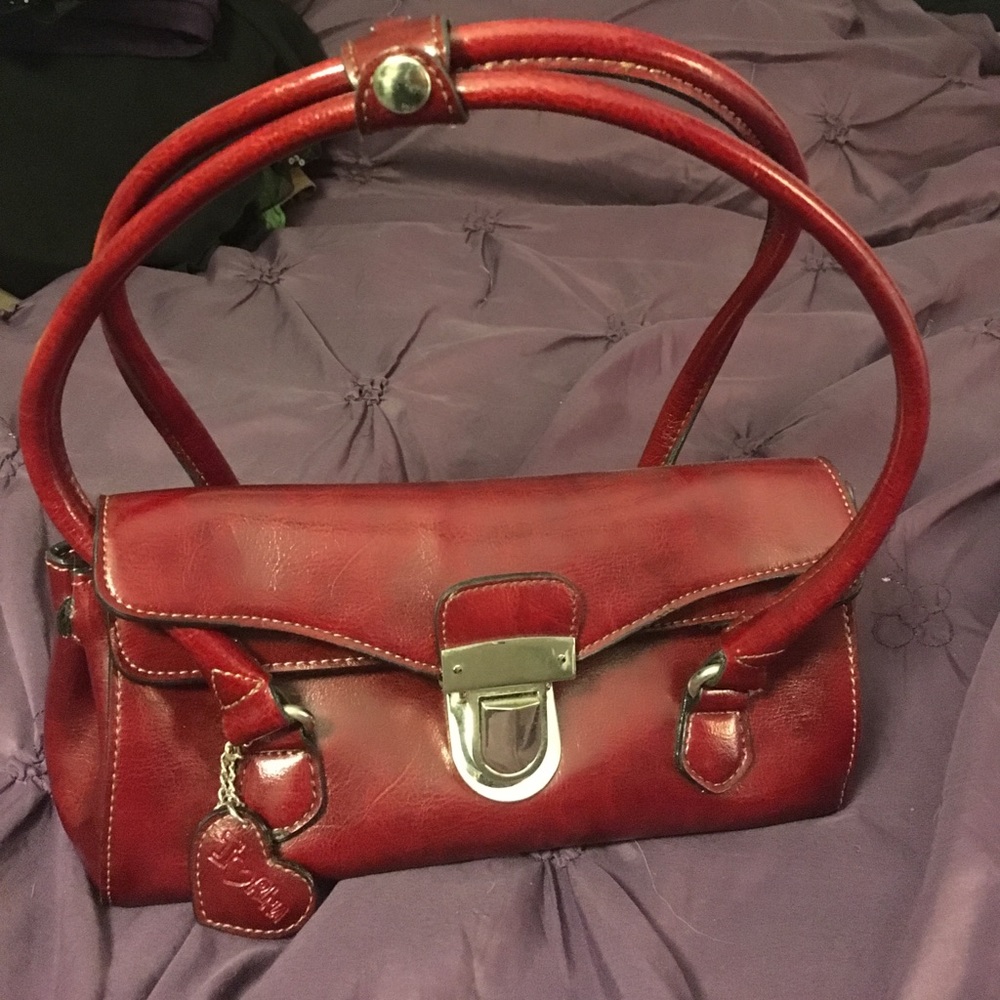 Dark red Rina Rich small satchel purse