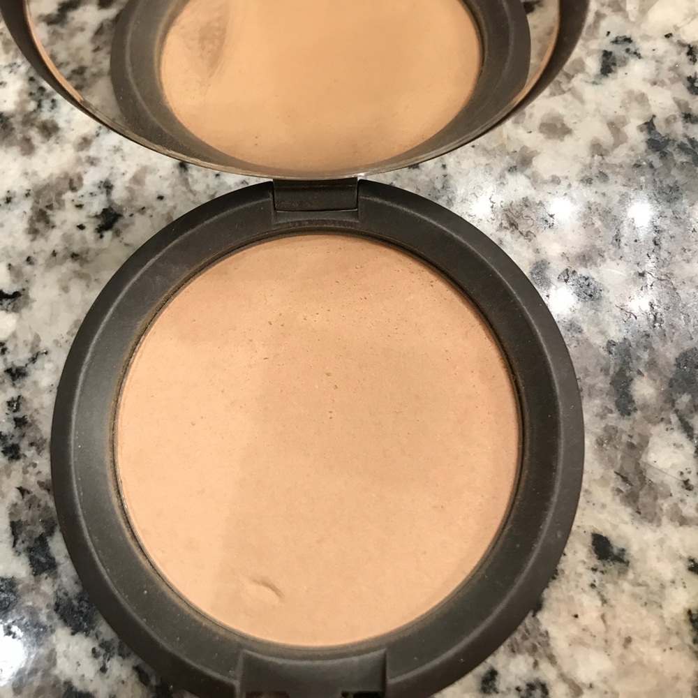 Becca perfect skin mineral powder foundation.