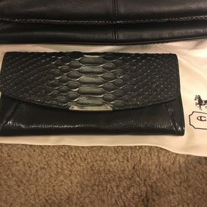 Black Coach wallet with faux snakeskin