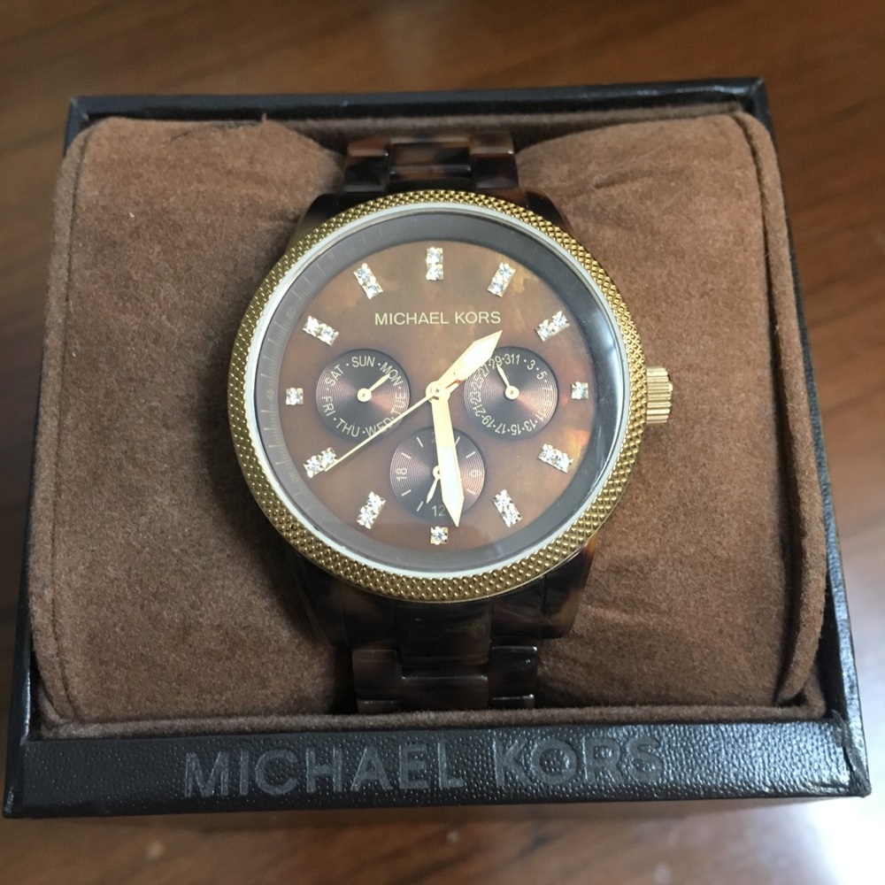 MK tortoise shell watch