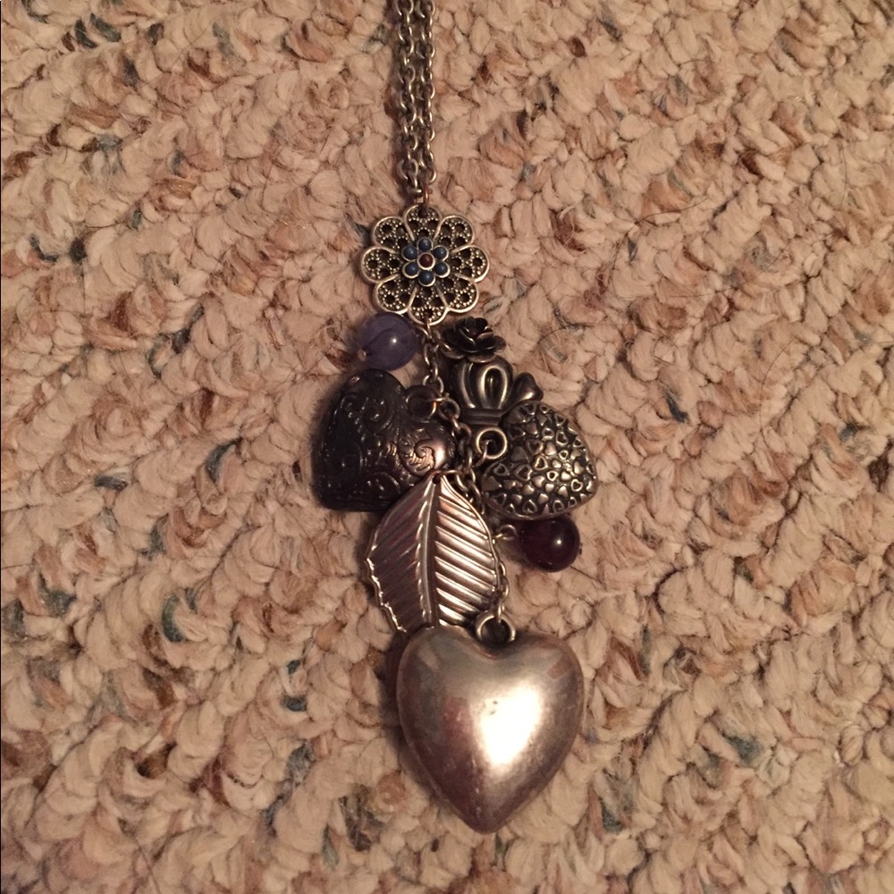 Long silver chain necklace w/ charms at the bottom