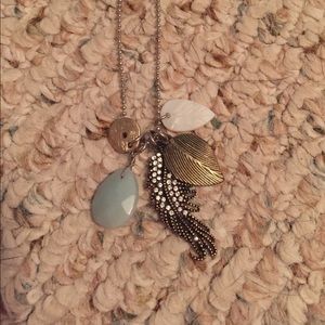 Long, dainty silver charm necklace