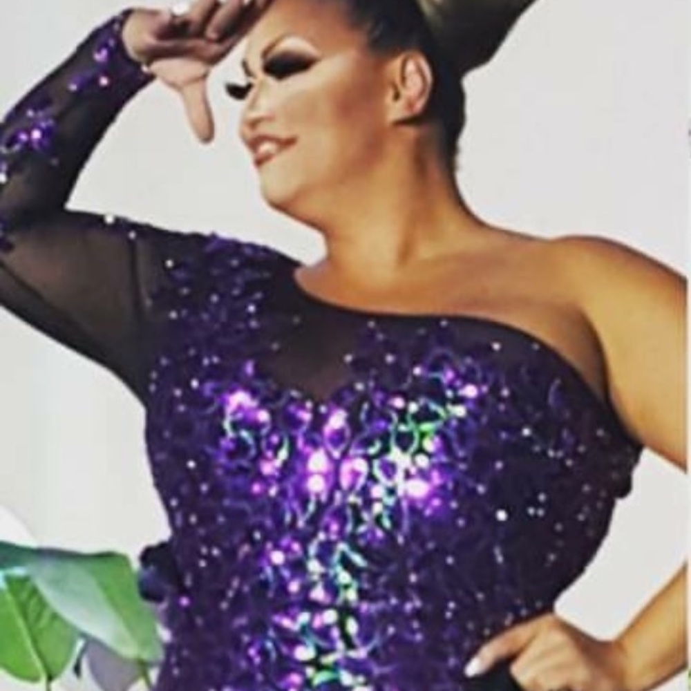 One sleeve purple sequin gown with  bustle