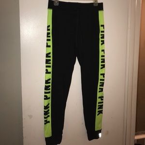 Black and neon yellow joggers from pink medium