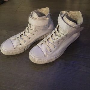 White leather Converse high tops