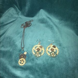 A gear set of earrings and necklace