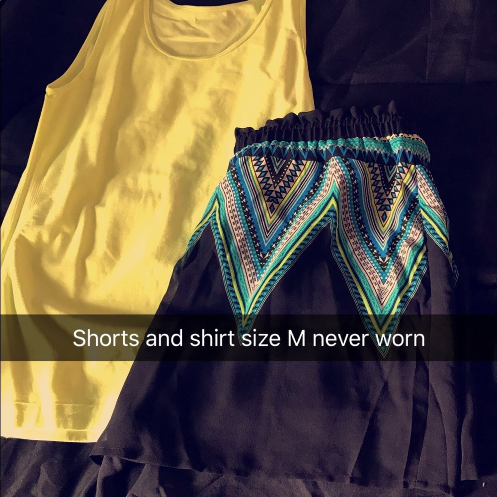 Small lime green top med black shorts