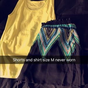 Small lime green top med black shorts
