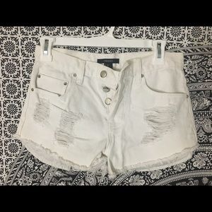 Distressed white high waisted shorts