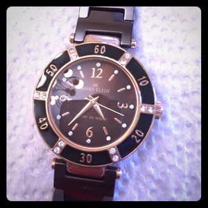 Anne Klein brown ceramic band w/ rose gold casing