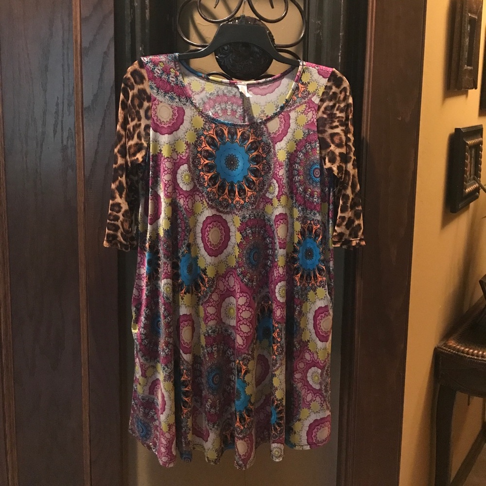 Lilypad swing shirt. Pockets and shear sleeves.