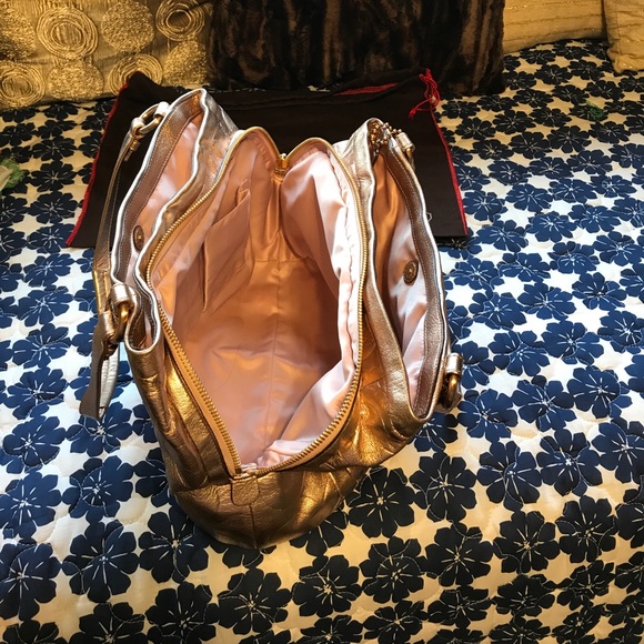 Metallic rose gold Coach purse. - Picture 3 of 6