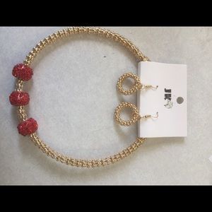 Gold necklace with earrings to match
