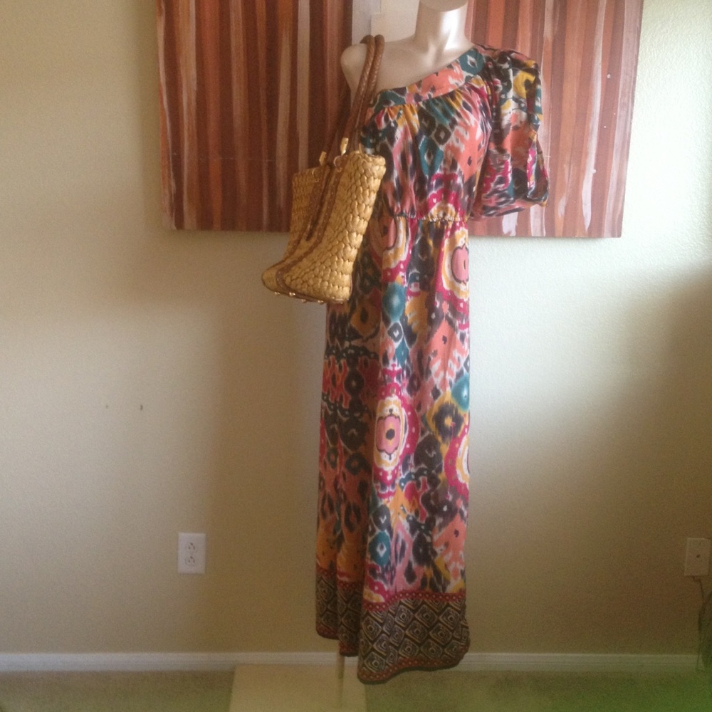 Cold shoulder dress  with slit at bottom and arm