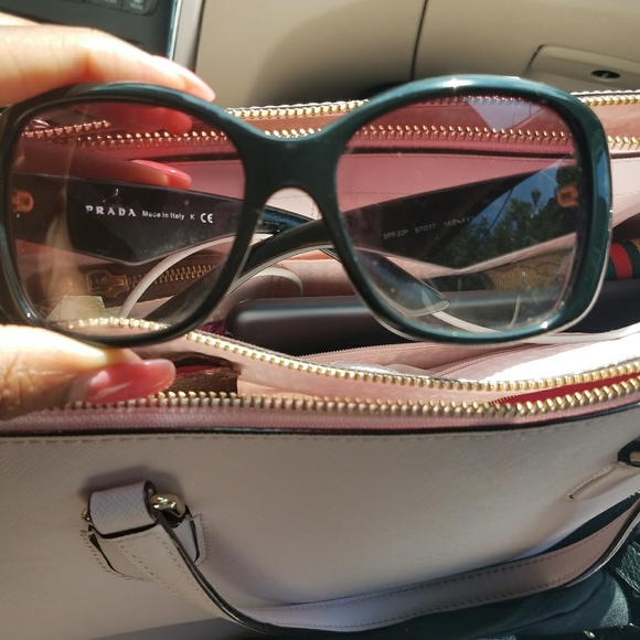 Prada sunglasses triangle logo