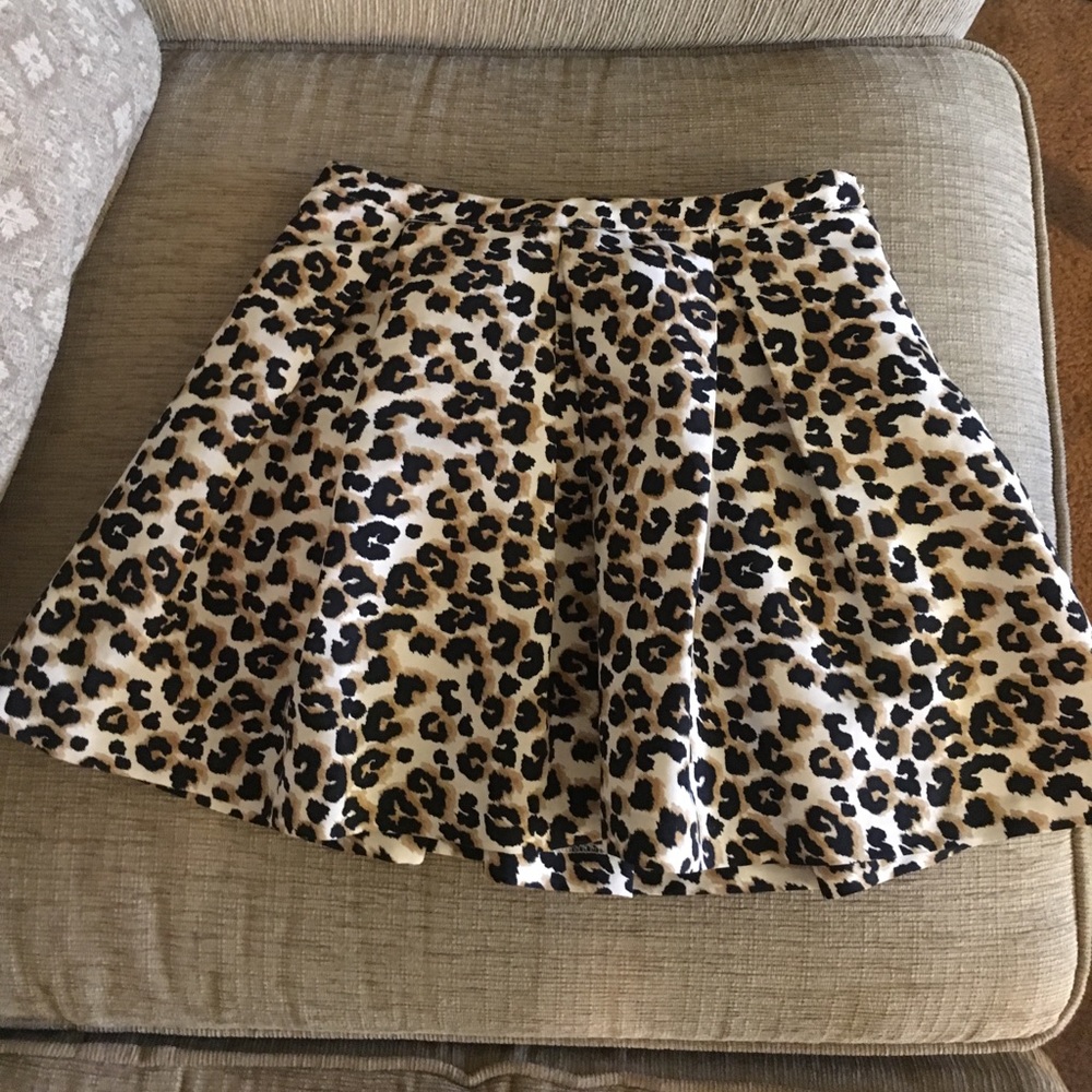 Leopard print mini skirt.
