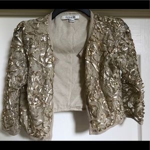 Gold-ribboned tan jacket