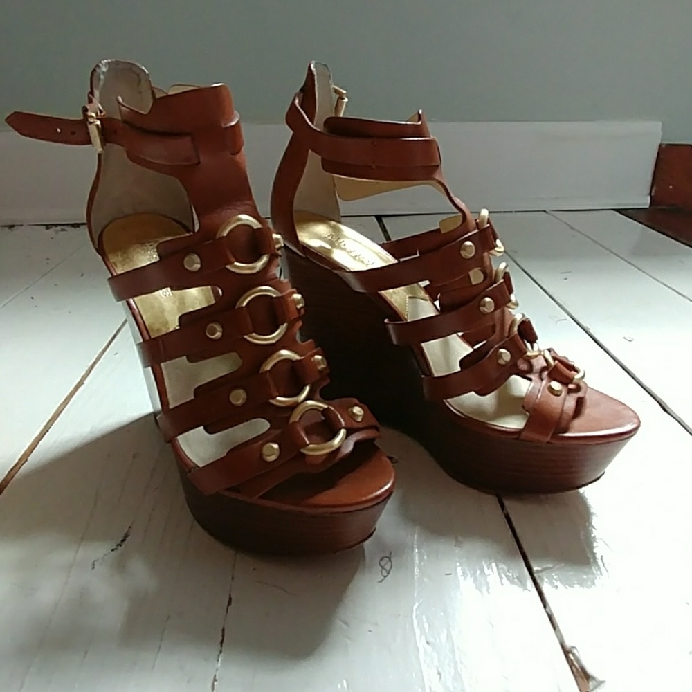 Michael Kors tan sandle wedges.