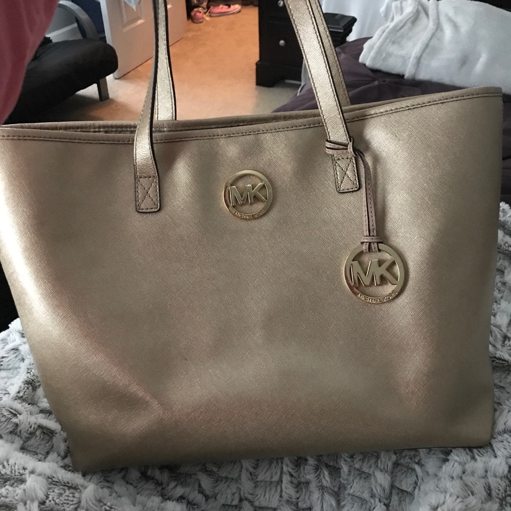 Gold Michael Kors purse