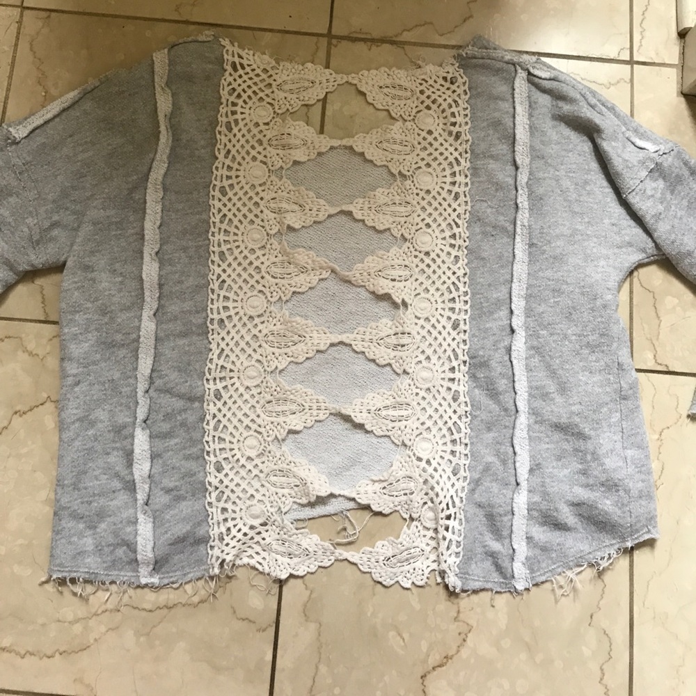 Free people pull over with lace details in back
