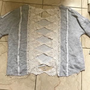 Free people pull over with lace details in back