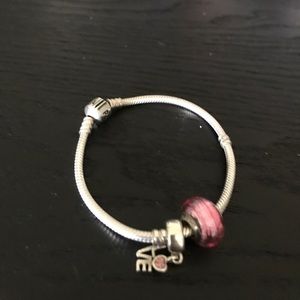 Pandora bracelet with two charms
