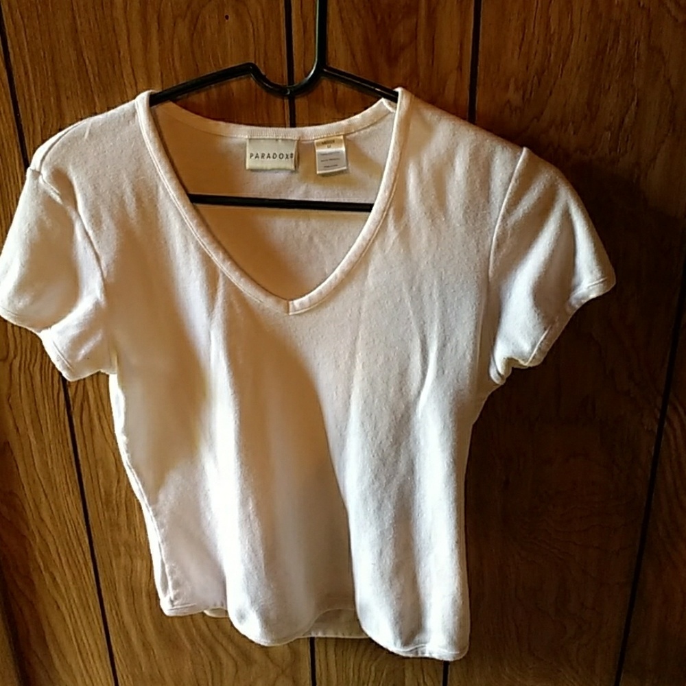 A little tiny shirt, white.