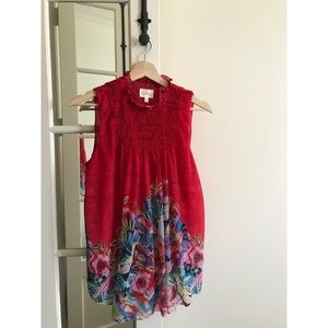 Highneck sleeveless swing top with floral print