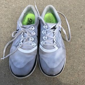 Women's white and black Nike running shoe