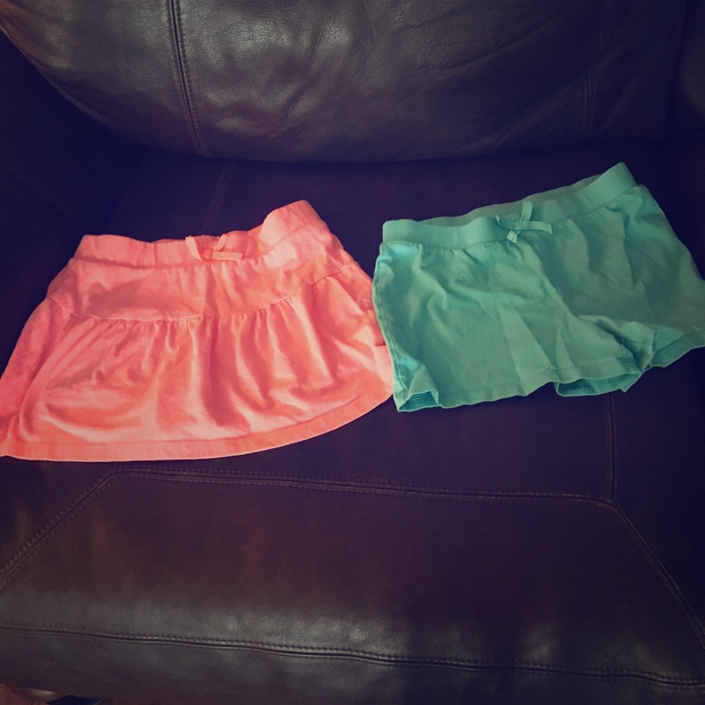 1 pink skirt. 1 blue skirt.